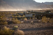 U.S. Marines with Mike Battery, 3rd Battalion, 11th Marine Regiment, 1st Marine Division, set up a gun line at a firing position during Steel Knight 2016 (SK-16) at Marine Corps Air Ground Combat Center Twentynine Palms, Calif., Dec 11, 2015. SK-16 is an annual military exercise developed to prepare 1st Marine Division personnel within the Ground Combat Element of a Marine Air-Ground Task Force. (U.S. Marine Corps photo by Lance Cpl Ryan Kierkegaard 1st Marine Division Combat Camera /Released)