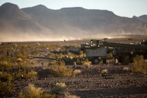 U.S. Marines with Mike Battery, 3rd Battalion, 11th Marine Regiment, 1st Marine Division, set up a gun line at a firing position during Steel Knight 2016 (SK-16) at Marine Corps Air Ground Combat Center Twentynine Palms, Calif., Dec 11, 2015. SK-16 is an annual military exercise developed to prepare 1st Marine Division personnel within the Ground Combat Element of a Marine Air-Ground Task Force. (U.S. Marine Corps photo by Lance Cpl Ryan Kierkegaard 1st Marine Division Combat Camera /Released)