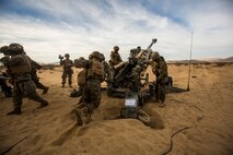 U.S. Marines with India Battery, 3rd Battalion, 11th Marine Regiment, 1st Marine Division, conduct a fire mission during Steel Knight 2016 (SK-16) at Marine Corps Air Ground Combat Center Twentynine Palms, Calif., Dec 10, 2015. SK-16 is an annual military exercise developed to prepare 1st Marine Division personnel within the Ground Combat Element of a Marine Air-Ground Task Force. (U.S. Marine Corps photo by Lance Cpl Ryan Kierkegaard 1st Marine Division Combat Camera /Released)