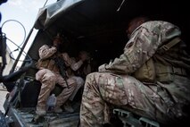 U.S. Marines with 1st Reconnaisance Battalion, 1st Marine Division board a HUMVEE during Steel Knight 16 (SK-16) at Marine Corps Air-Ground Combat Center Twenty-nine Palms, Calif., Dec. 11, 2015. Steel Knight is an annual field training exercise that enables 1st Marine Division to test and refine its command and control capabilities by acting as the headquarters element for a forward-deployed Marine Expeditionary Force.(U.S. Marine Corps Combat Camera Photo by Lance Cpl. Nathaniel Castillo/RELEASED)