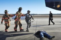 First responders approach the scene of a failed hijacking attempt during an anti-hijacking exercise Dec. 7 at Duke Field, Fla.  The exercise was part of the overall Air Force Reserve Command Unit Effectiveness Inspection  of the 919th Special Operations Wing Dec. 3-8, which highlighted a new process for evaluating mission readiness.  (U.S. Air Force photo/Dan Neely)
