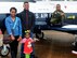 Derrick James, 8-year-old Pilot for a Day participant, right, his mother and two siblings stand next to a T-6 Texan II Dec. 22 at Columbus Air Force Base, Mississippi. During the day, James and his family learned about the base’s mission, visited static aircraft displays and more. (U.S. Air Force photo/Melissa Doublin)