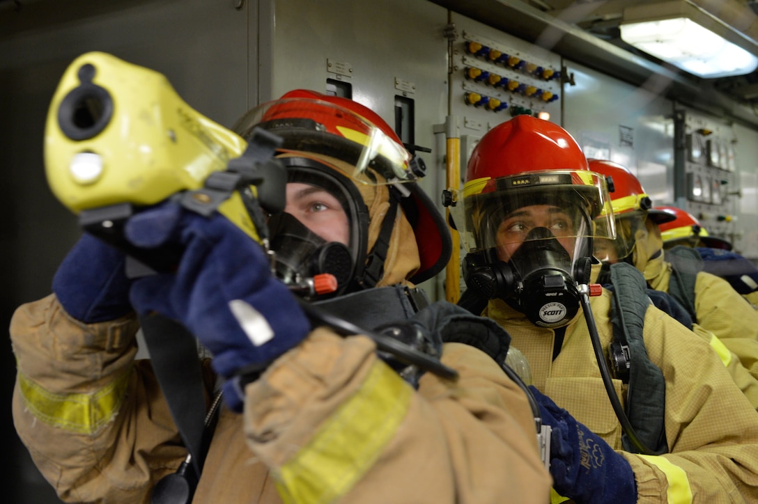 A U.S. sailor uses a K-90 Talisman XL thermal imager while participating in a fire drill aboard the USS Ross in the Black Sea, Dec. 10, 2015. U.S. Navy photo by Petty Officer 2nd Class Justin Stumberg