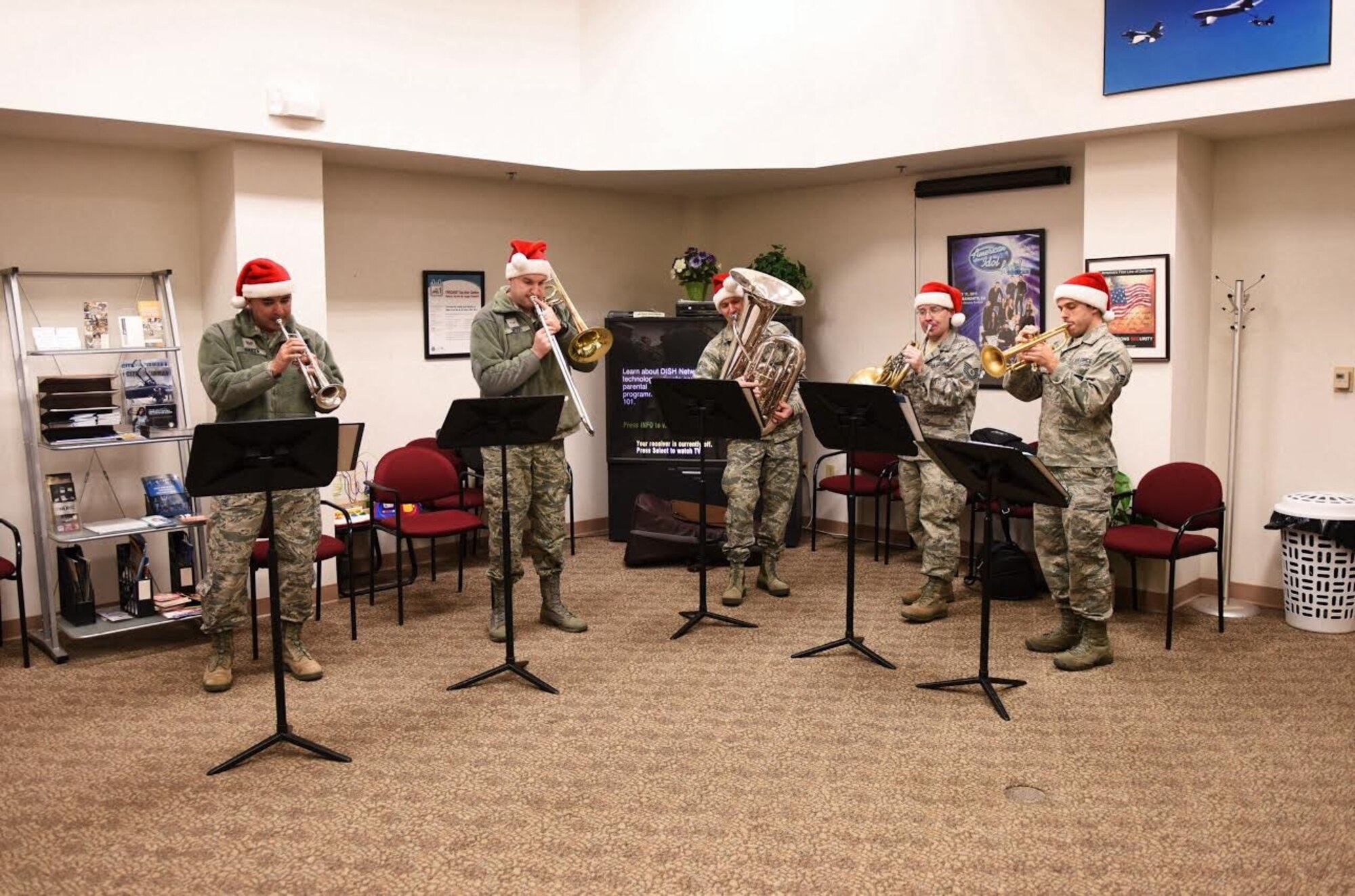 The Travis Brass ensemble of the United States Air Force Band of the Golden
West, performs holiday music at the 940th Wing headquarters Dec. 15, 2015 at
Beale Air Force Base, CA.  The quintet based out of Travis Air Force Base,
CA visited Beale and performed at various locations. (U.S. Air Force photo
by Staff Sgt. Brenda Davis/Released)

