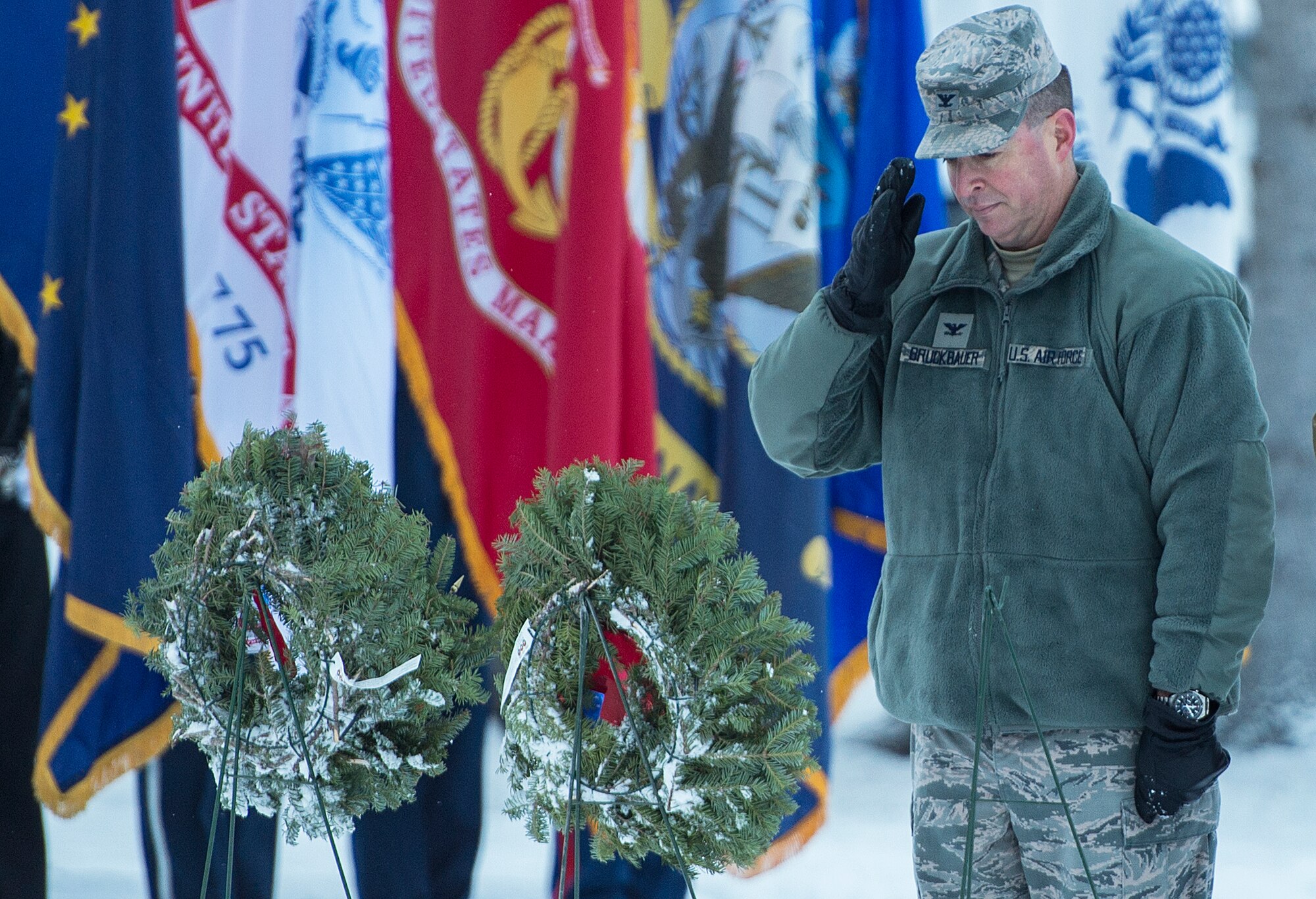 Joint Base Elmendorf-Richardson (JBER) participates in Wreaths Across America Day at the Ft. Richardson National Cemetery, JBER, December 12, 2015.  Wreaths Across America is a nonprofit organization founded to continue and expand the annual wreath laying ceremony at Arlington National Cemetery begun by Maine businessman, Morrill Worcester, in 1992 when his company, Worecester Wreath had a surplus of holiday wreaths.  Wreaths Across America is held annually on the second Saturday of December.  (U.S. Air Force photo by Senior Airman James Richardson)