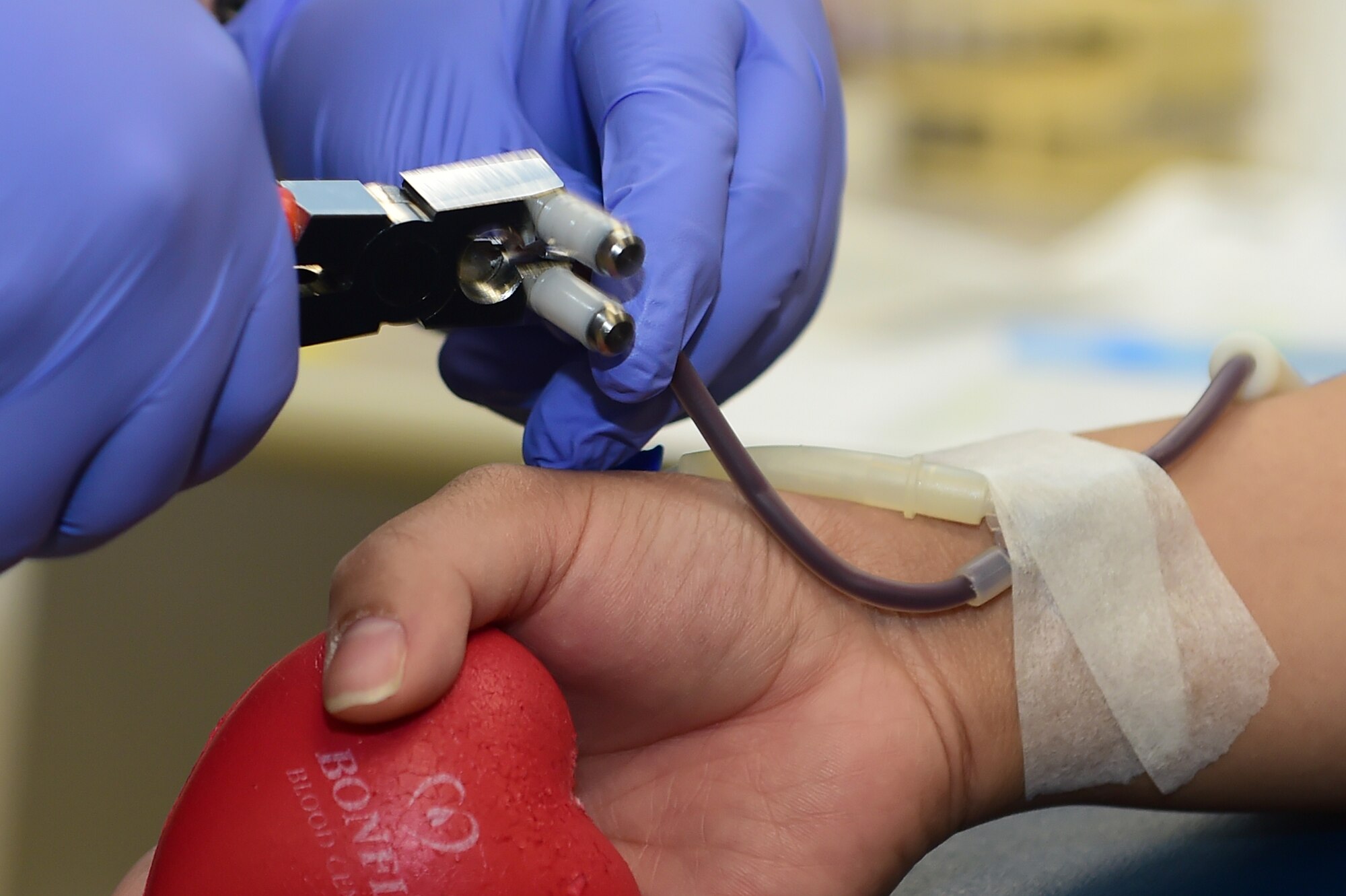 Team Buckley members participate in a blood drive hosted by Bonfils Blood Center at the Health and Wellness Center Dec. 22, 2015, on Buckley Air Force Base, Colo. The Bonfils Blood Center looks to build awareness and donations for those in need. (U.S. Air Force photo by Airman 1st Class Luke W. Nowakowski/Released)