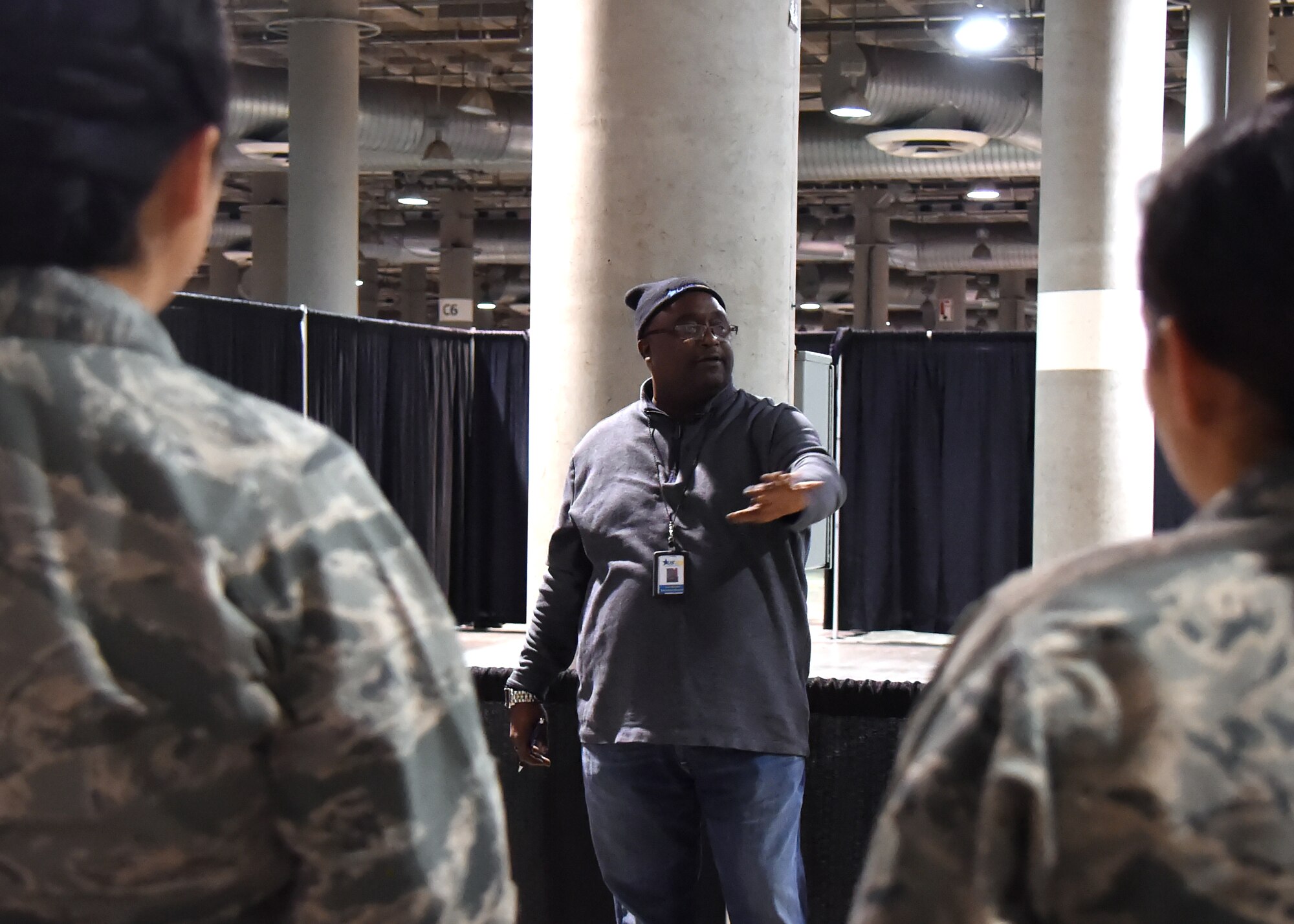 Ivan Mason, executive director of U.S. Vets Inglewood briefs volunteers from the Space and Missile Systems Center prior to setting up for the 2nd annual L.A. Vets Stand Down at the Los Angeles Convention Center Dec. 18, 2015. United States Veterans Initiatives, a private non-profit organization is one of many private and public services who came together with SMC volunteers during the three-day event held Dec. 19-21 to provide housing, employment, and counseling services to homeless veterans living on the streets or shelters in Los Angeles. (U.S. Air Force photo/Sarah Corrice)