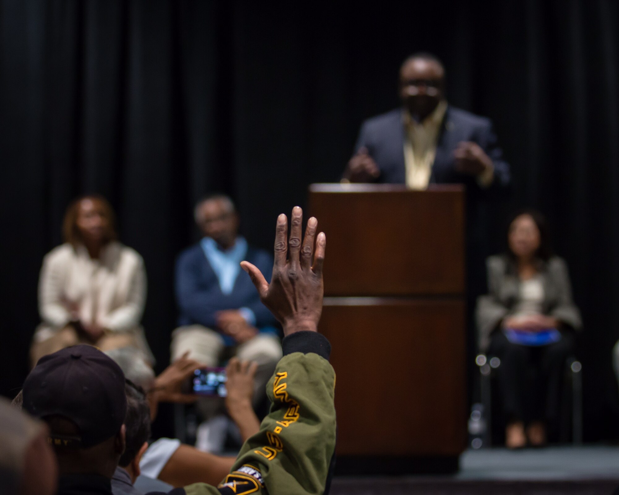 An Army veteran raises his hand to ask a question of Ivan Mason, executive director of U.S. Vets Inglewood during the 2nd annual L.A. Vets Stand Down. More than 65 volunteers from SMC joined service providers from federal, state, city and county governments as well as local nonprofit partners from across Los Angeles County and the South Bay Dec. 19-21 at the Los Angeles Convention Center. (U.S. Air Force photo/Lt. Col. Chris Troyer)