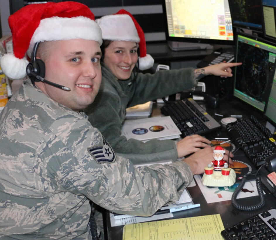 Staff Sgt. Tom Silva and Staff Sgt. Rachael Alcorta conduct training in preparation for Santa's annual trip. EADS supports NORAD's Santa tracking operation, which is celebrating its 60th anniversary this Christmas Eve.