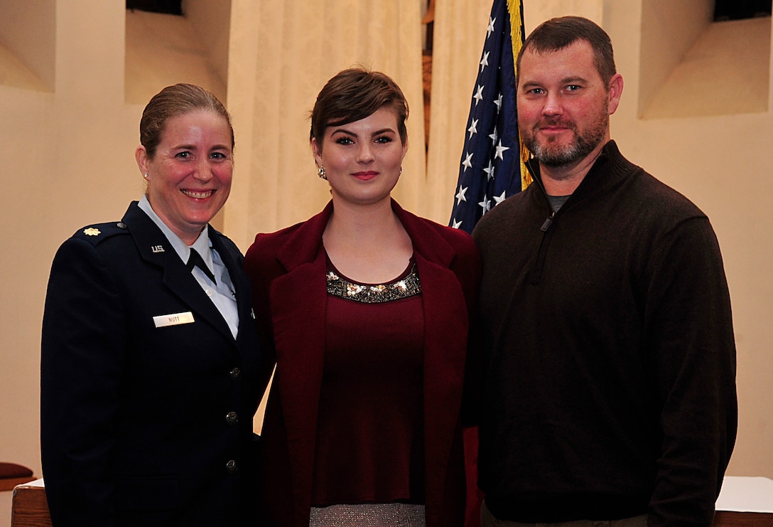 From left, U.S. Air Force Maj. Brittany Nutt, a women's health nurse practitioner with the 86th Medical Squadron, Kiersten Nutt and Steve Nutt, pose for a photo at Landstuhl Regional Medical Center, Germany, after Kiersten enlisted in the Air Force, Nov. 23, 2015. U.S. Air Force photo by Airman 1st Class Larissa Greatwood