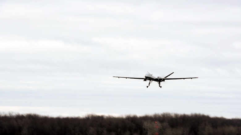 The New York Air National Guard's 174th Attack Wing conducted their first MQ-9 Reaper flying operation from Hancock Field Air National Guard Base and Syracuse Hancock International Airport, N.Y., Dec. 16, 2015. The 174th ATKW is the first Air Force organization in the U.S. to fly a remotely piloted aircraft in class C airspace, the common airspace around commercial airports. Prior to this week, all flight operations of the MQ-9 were conducted at Wheeler-Sack Army Airfield at Fort Drum, N.Y. (U.S. Air Force photo/Master Sgt. Eric Miller)
