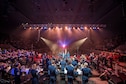 Col. Larry Lang conducts The U.S. Air Force Band along with the U.S. Air Force Honor Guard Color Team during the national anthem at the opening of the final holiday concert at DAR Constitution Hall in Washington D.C., Dec. 18, 2015. (U.S. Air Force photo/Senior Master Sgt. Kevin Burns) 
