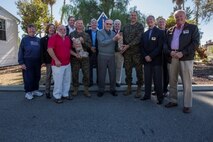 Maj. Gen. Daniel J. O’Donohue and Sgt. Maj. William T. Sowers stand for a quick photo opportunity following a ceremony with the San Diego Nice Guys charity group, Dec. 16, 2015. During the ceremony, the San Diego Nice Guys presented their annual contribution from the Marine Family Christmas Fund to assist local military families in their holiday grocery shopping. Since 1997, the MFCF has supported thousands of families, primarily those who have forward deployed Marines and sailors of the Blue Diamond division, with generous donations for the holiday season.