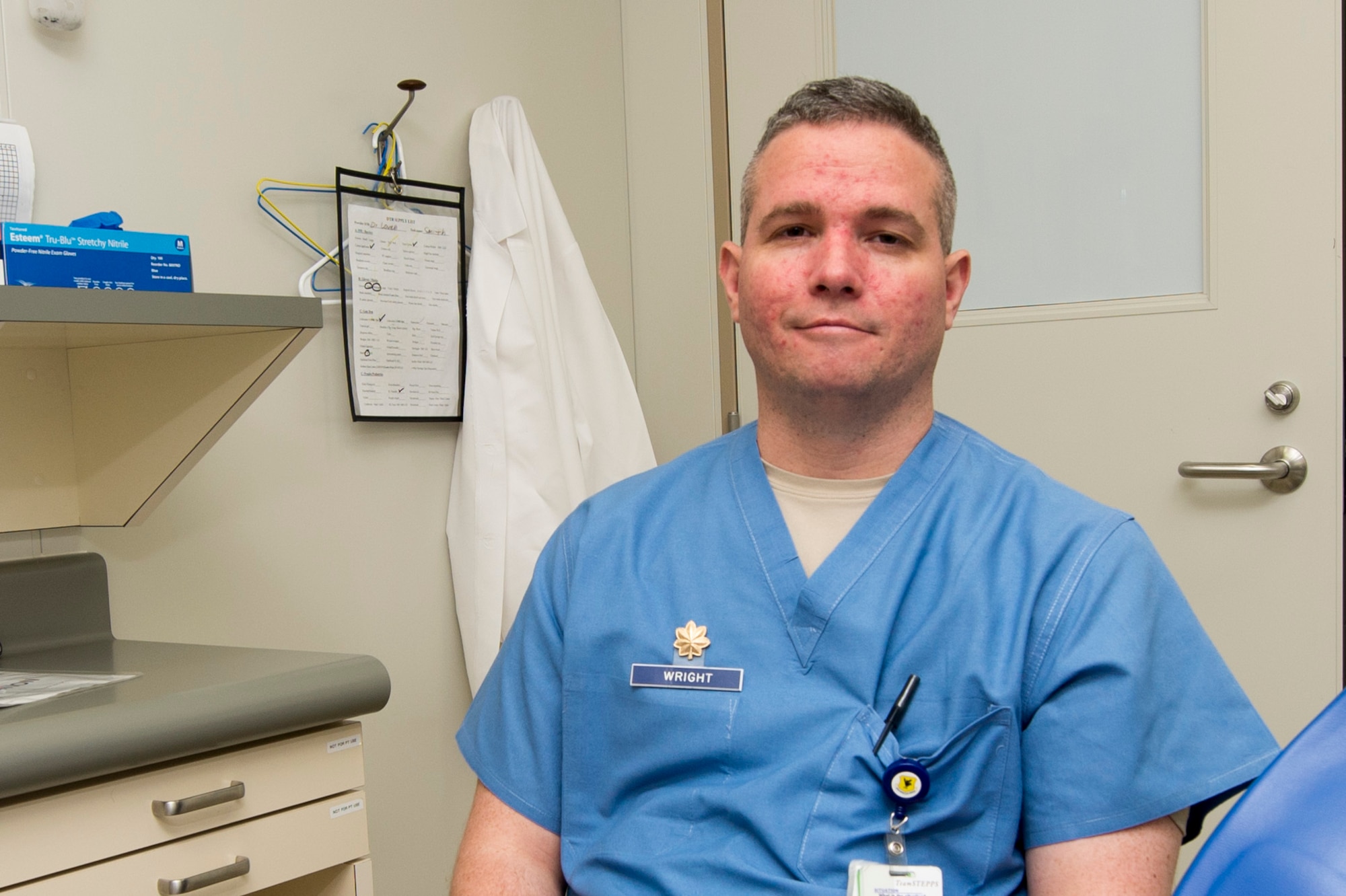 U.S. Air Force Maj. William Wright, 18th Dental Squadron clinical flight commander, reflects on how he got to perform his dream job, Dec. 16, 2015, at Kadena Air Base, Japan. Wright decided to become a dentist while attending Kadena High School and began his career as an enlisted dental technician in the U.S. Air Force. (U.S. Air Force photo by Senior Airman Omari Bernard)