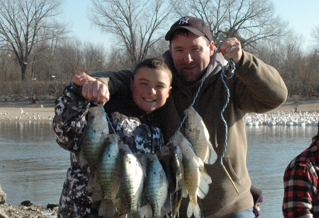 Father and Son with Fish