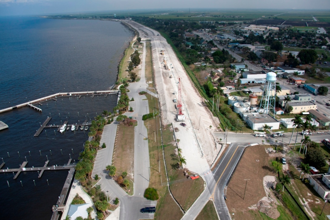 Crews install a partial cutoff wall in the middle of the Herbert Hoover Dike near Pahokee in 2012.  The U.S. Army Corps of Engineers installed 21.4 miles of cutoff wall in the southeast side of the dike surrounding Lake Okeechobee from 2007-2013.