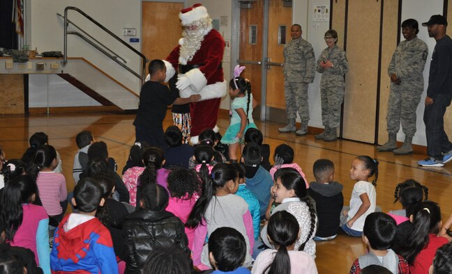 Organized by the Airmen of the 349th Air Mobility Wing, supported by the 349th Medical and Maintenance Group "elves," OTB visits local schools bearing gifts bags for the children in hopes of making their holidays a little more merry and bright! 