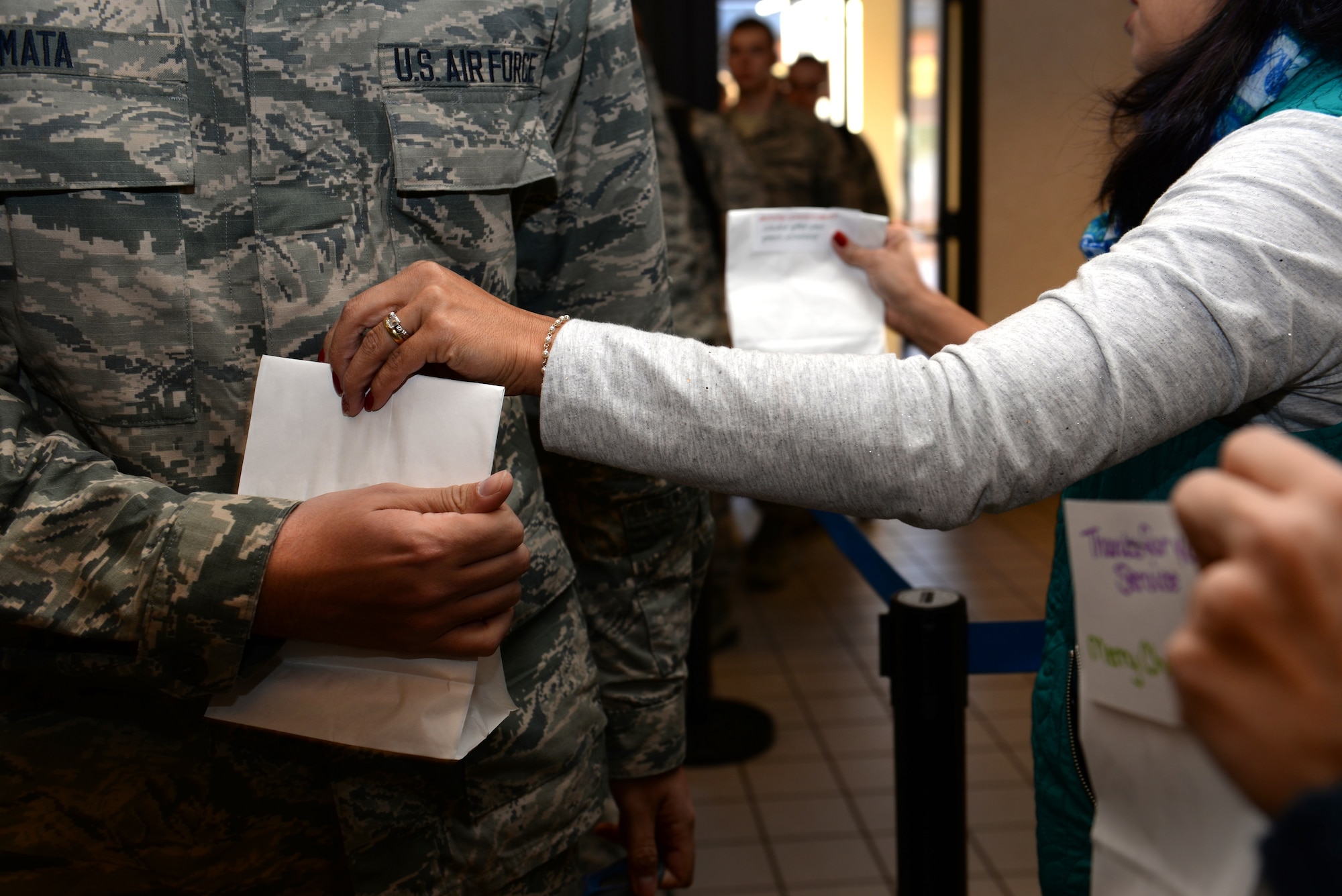 The Key Spouses organization and the community program at Sheppard Air Force Base, Texas, was able to raise enough cookies through its Colossal Cookie Drive. Because of those who donated their treats, time, and effort, every Airmen in Training was able to start their holiday season off with holiday cheer from their Sheppard family. (U.S. Air Force photo/2nd Lt. Brittany Curry)