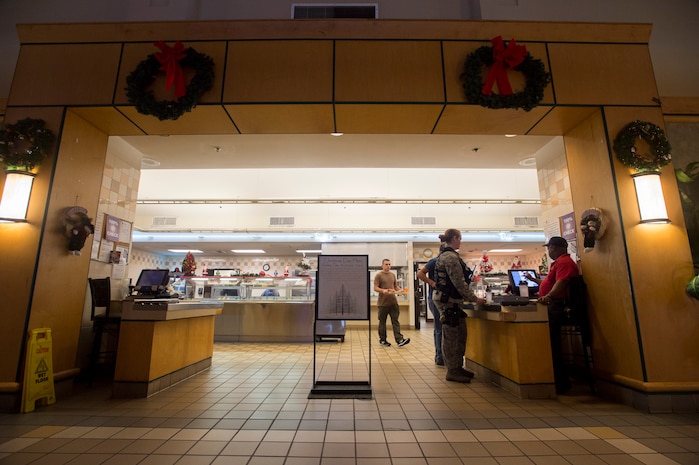 Joint Base Charleston members utilize the Air Base dining facility Dec. 23, 2015, on JB Charleston – Air Base, S.C. The Air Base DFAC will be serving Christmas lunch and dinner for anybody who has unrestricted access to JB Charleston. (U.S. Air Force photo/Staff Sgt. George Goslin)