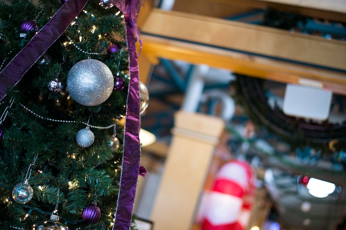 Trees and lights decorate the dining facility halls Dec. 22, 2015, at the Gaylord Dining Facility on Joint Base Charleston – Air Base, S.C. The Air Base DFAC will be serving Christmas lunch and dinner for anybody who has unrestricted access to JB Charleston. (U.S. Air Force photo/Senior Airman Clayton Cupit)