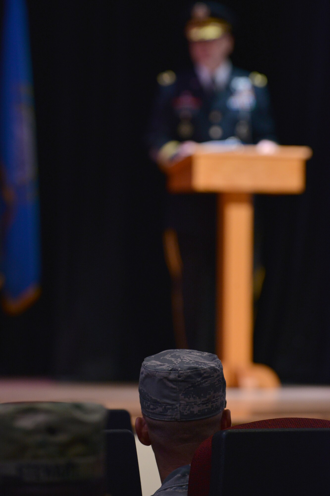 U.S. Airmen and Soldiers listen as U.S. Army Maj.  Gen. Anthony C. Funkhouser, commander of U.S. Army Training and Doctrine Command Center for Initial Military Training (CIMT), speaks during the CIMT change of responsibility at Fort Eustis, Va., Dec. 16, 2015. Service members from across Joint Base Langley-Eustis’ installations were in attendance for  the ceremony. (U.S. Air Force photo by Staff Sgt. Natasha Stannard)