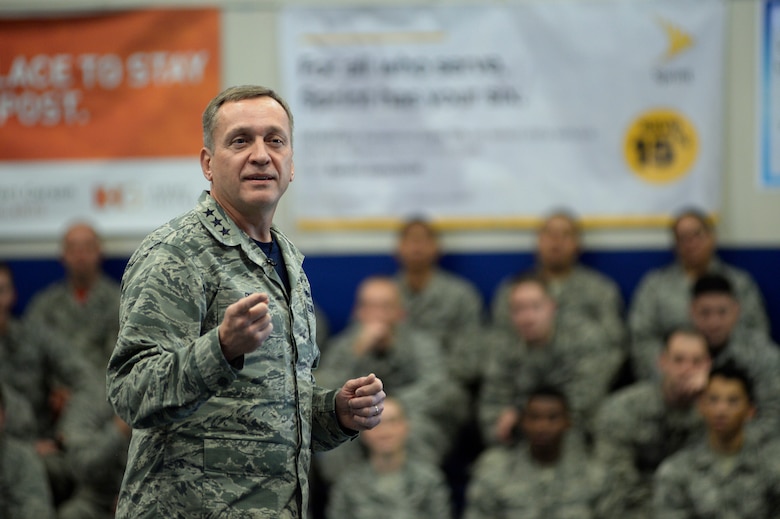Lt. Gen. David J. Buck, Commander, 14th Air Force (Air Forces Strategic), Air Force Space Command; and Commander, Joint Functional Component Command for Space, U.S. Strategic Command, addresses the Airmen during a commander’s call Friday, Dec. 18, 2015, at Schriever Air Force Base, Colorado. During the commander’s call, he commended Team Schriever for being the “heart beat of space” and leading the way in space operations. Buck visited Schriever to observe the recently concluded Schriever Wargame 2015 exercise, designed to explore critical space issues in depth. (U.S. Air Force photo/Dennis Rogers)