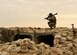 Staff Sgt. Andrew Croop, a 386th Air Expeditionary Wing explosive ordnance disposal technician, picks up a simulated rocket launcher during a joint EOD training exercise at an undisclosed location in Southwest Asia, Dec. 15, 2015. As part of the exercise, Croop conducted a manual sweep of a suspicious area in search of ordnances and secured the area. (U.S. Air Force photo/Staff Sgt. Jerilyn Quintanilla)