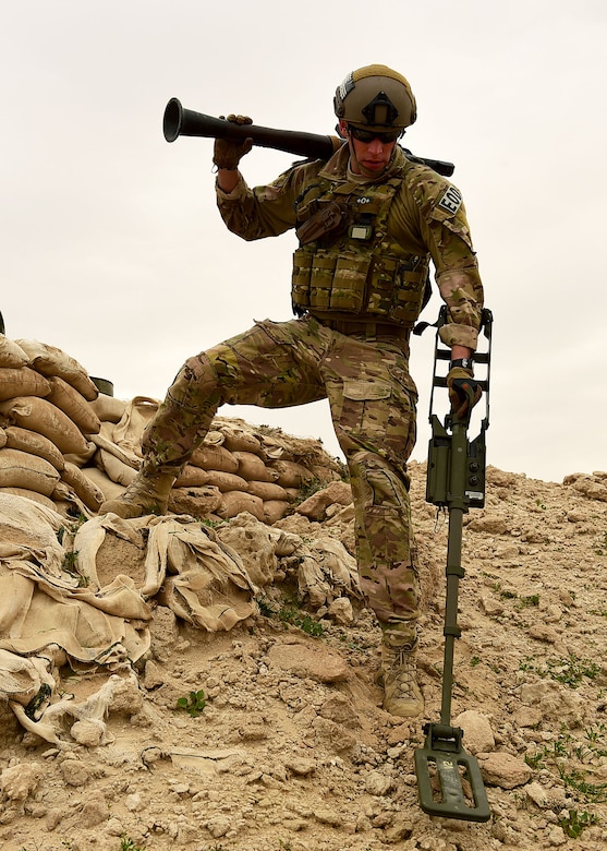 Staff Sgt. Andrew Croop, a 386th Air Expeditionary Wing explosive ordnance disposal technician, scans the area for ordnances during a joint EOD training exercise at an undisclosed location in Southwest Asia, Dec. 15, 2015. The 386th EOD flight is responsible for locating, assessing and disposing of ordnances in the area. (U.S. Air Force photo by Staff Sgt. Jerilyn Quintanilla) 