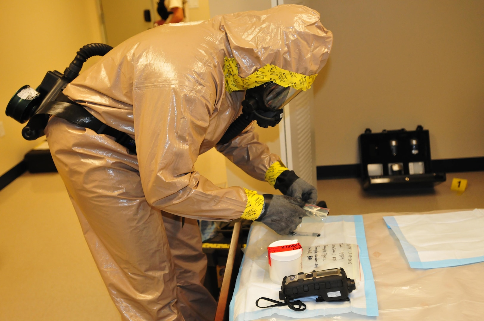 A survey team member of the 23rd Civil Support Team tests the pH level of an unknown liquid that was collected for testing during a terrorist threat exercise, Dec. 3, 2015. The 23rd and 48th CSTs participated in Operation Guardian Spear, an inter-operability exercise that tested how both CSTs and the FBI team worked together to protect the citizens on the Virgin Islands.