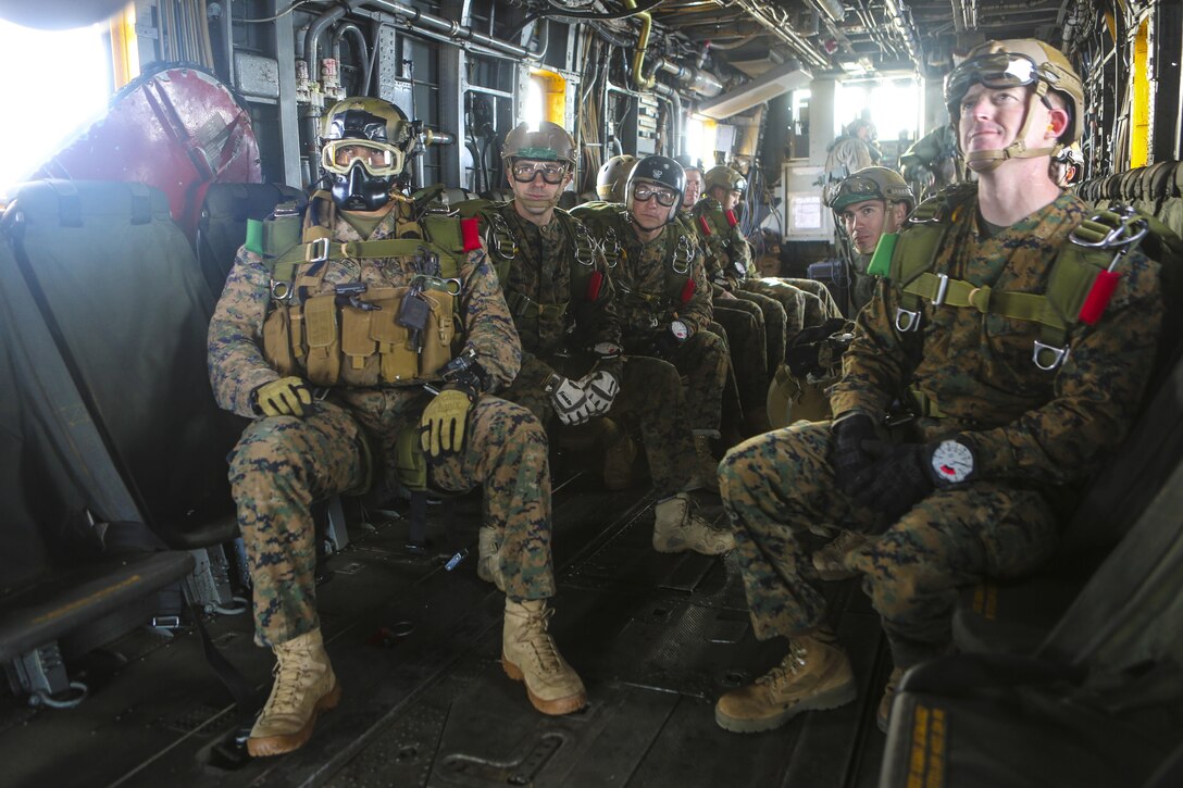 Marines with the 1st Expeditionary Operations Training wait to reach the proper altitude before a free fall jump at 10,000 feet above Drop Zone Basilone, Marine Corps Base Camp Pendleton, Calif., Dec. 21. Marine Heavy Helicopter Squadron (HMH) 462 supported the 1st EOTG in their parachute-operations training. This training is intended to improve the Marines’ skill for future uses of this knowledge, such as a deployment situation. Units like the 1st EOTG deploy often and this training allows the Marines to be ready to deploy at a moment’s notice.(U.S. Marine Corps photo by Lance Cpl. Harley Robinson/Released)