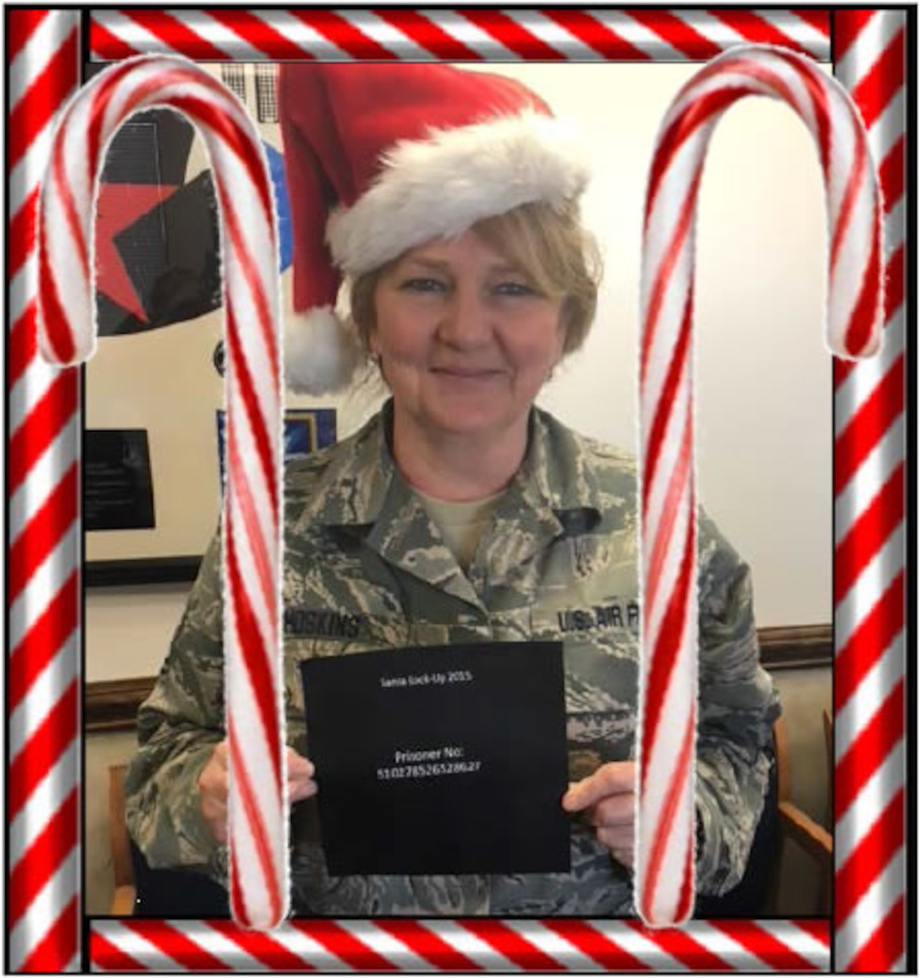 Mugshot of Master Sgt. Beverley Hoskins, 916th Combat Crew Communications superintendent, showing her prisoner number. Hoskins was put in Santa jail for nearly an hour during the Second Annual Santa Lock-up fundraiser sponsored by the 4th Fighter Wing Security Forces (courtesy photo illustration).