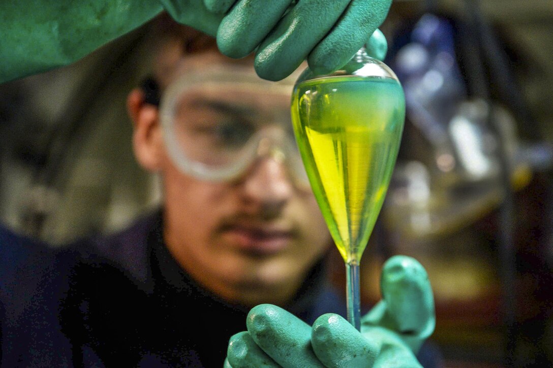 U.S. Navy Seaman Brandon Seymer conducts a bottom sediment and water test aboard the USS Ross in the Black Sea, Dec. 14, 2015. Seymer is a gas turbine systems technician fireman. The Ross is conducting a routine patrol in the U.S. 6th Fleet area of operations to support U.S. national security interests in Europe. U.S. Navy photo by Petty Officer 2nd Class Justin Stumberg