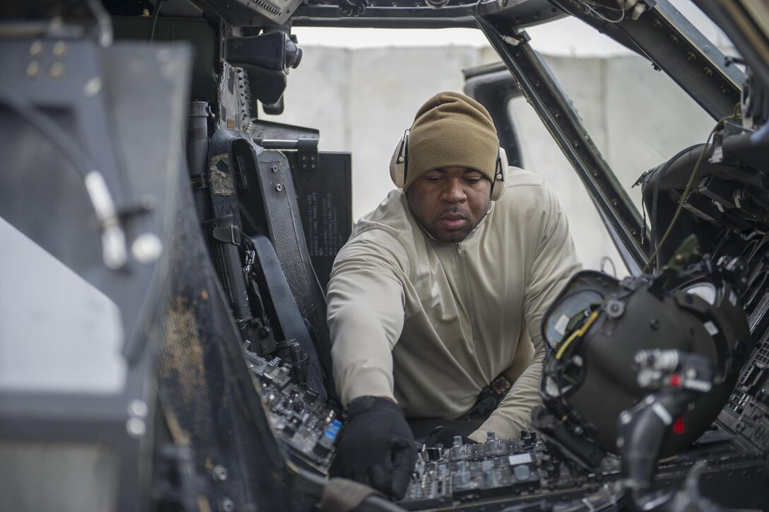 U.S. Air Force Staff Sgt. Mackel Stafford checks the flare count on an HH-60 Pave Hawk helicopter on Bagram Airfield, Afghanistan, Dec. 26, 2015. Stafford is a lead weapons technician assigned to the 455th Expeditionary Aircraft Maintenance Squadron. U.S. Air Force photo by Tech. Sgt. Robert Cloys