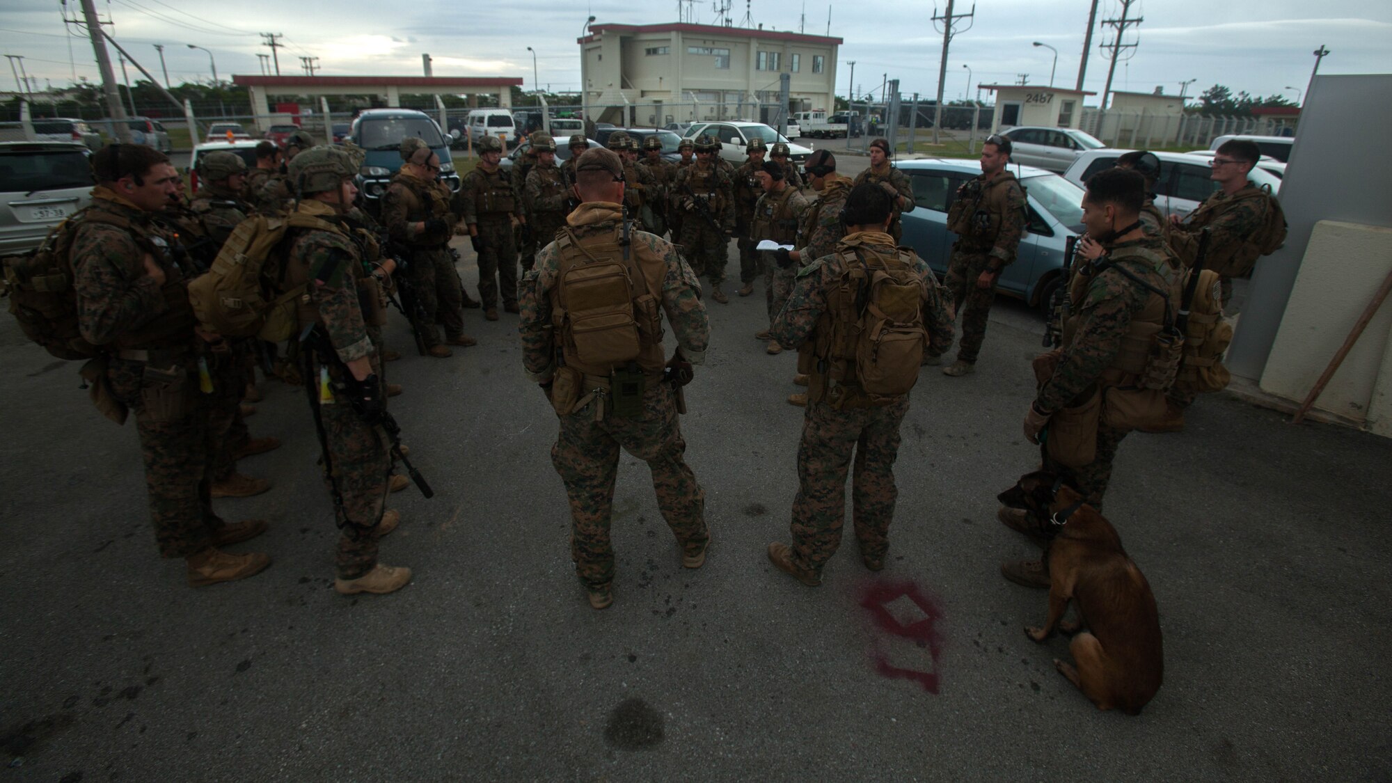 Marines with Maritime Raid Force, 31st Marine Expeditionary Unit, brief their final plan before going on a raid Dec. 10, 2015, on Camp Hansen, Okinawa, Japan. The raid is part of the MRF’s Interoperability Exercise 16-1. INTEROP is the first opportunity the Force Reconnaissance Platoon, Amphibious Reconnaissance Platoon, and the rifle platoon from the MEU's Battalion Landing Team have to combine as the MRF on the 31st MEU. 