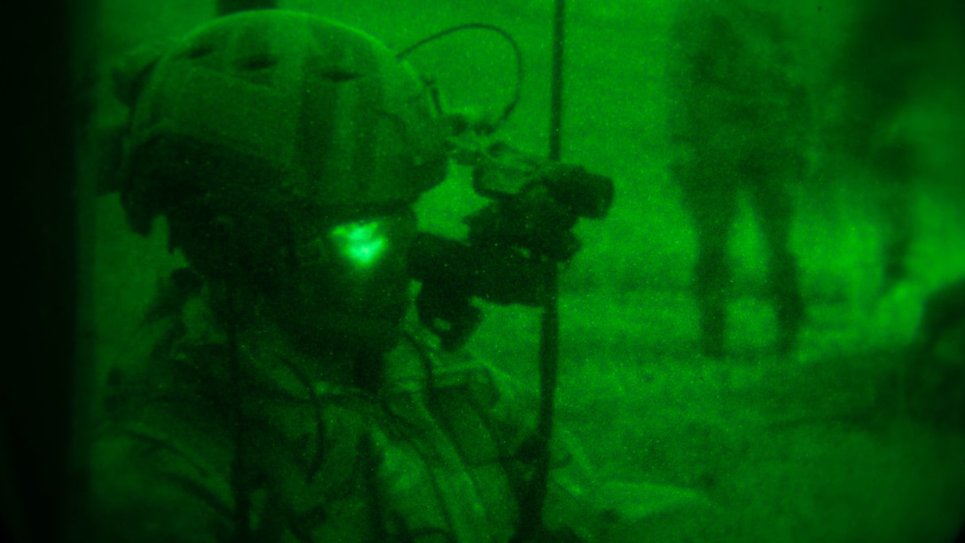 An Air Force joint terminal attack controller participates in a raid conducted by Maritime Raid Force, 31st Marine Expeditionary Unit, Dec. 14, 2015. The JTAC’s acted as the eyes on the ground for aircraft supporting the raid. The raid was part of Interoperability Exercise 16-1, an exercise used to build a working bond between MRF and the rest of the MEU quickly and effectively. 