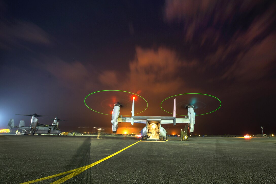 U.S. Marines prepare an MV-22 Osprey for a tail gun live-fire exercise in Southwest Asia, Dec. 20, 2015. The Marines, assigned to Marine Medium Tiltrotor Squadron 268, Special Purpose Marine Air-Ground Task Force-Crisis Response-Central Command, are capable of conducting assault operations as part of a crisis response mission spanning 20 nations in the U.S. Central Command area of responsibility. U.S. Marine Corps photo by Lance Cpl. Clarence Leake