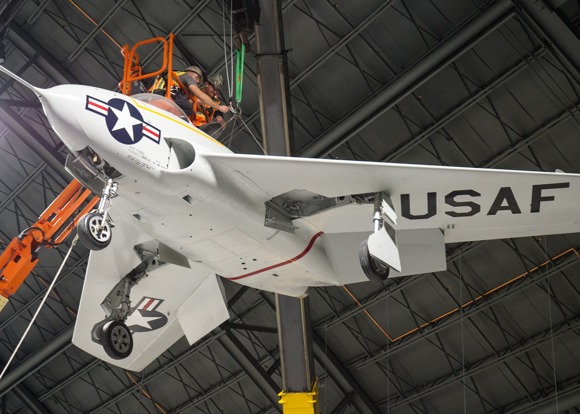 Restoration staff move the Northrop X-4 Bantam aircraft into position within the R&D Gallery at the National Museum of the U.S. Air Force in November 2015. (U.S. Air Force photo)