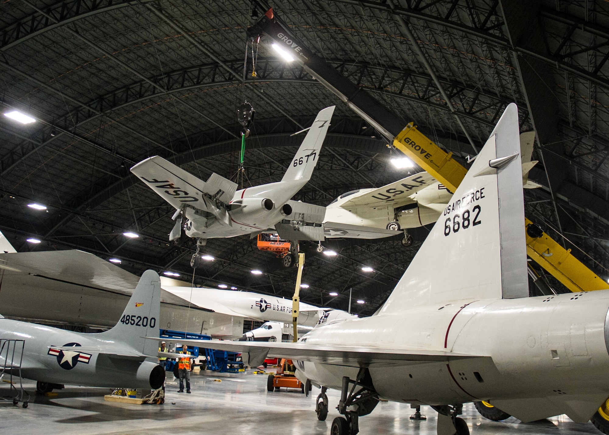Restoration staff move R&D aircraft into position within the new fourth building at the National Museum of the U.S. Air Force in November 2015. (U.S. Air Force photo)