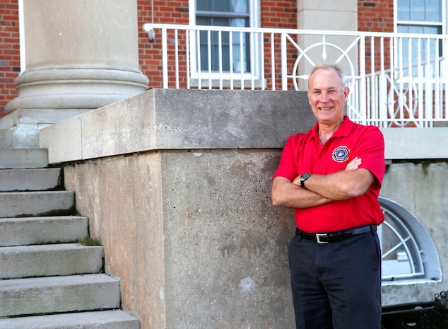 Kevin Scott, manpower, personnel and training lead for Combat Support Systems at Marine Corps Systems Command, stands in front of the command’s headquarters building aboard Marine Corps Base Quantico, Virginia. MCSC is now located in what was originally Naval Hospital Quantico where Scott was born. (U.S. Marine Corps photo by Mathuel Browne)