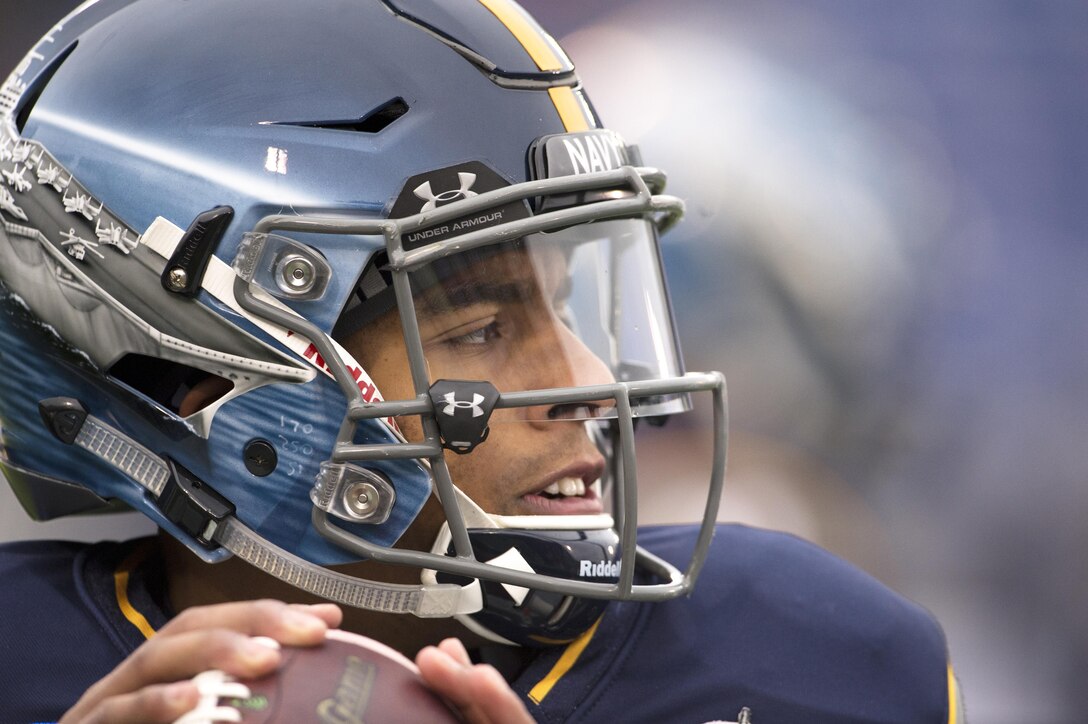 Navy quarterback Keenan Reynolds warms up for the 2015 Military Bowl at Navy-Marine Corps Memorial Stadium in Annapolis, Md., Dec. 28, 2015. DoD News photo by EJ Hersom