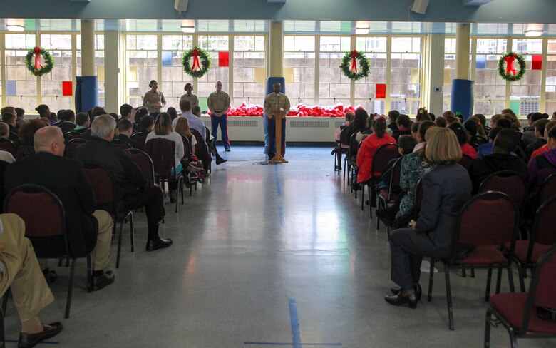 Marines from the 1st Marine Corps District visit Saint Anne’s School to speak to students about the Marine Corps, Dec. 21, 2015. The school invited the Marines to present them with Christmas stockings as appreciation for their service. (U.S. Marine Corps photo by Cpl. Brandon Thomas)
