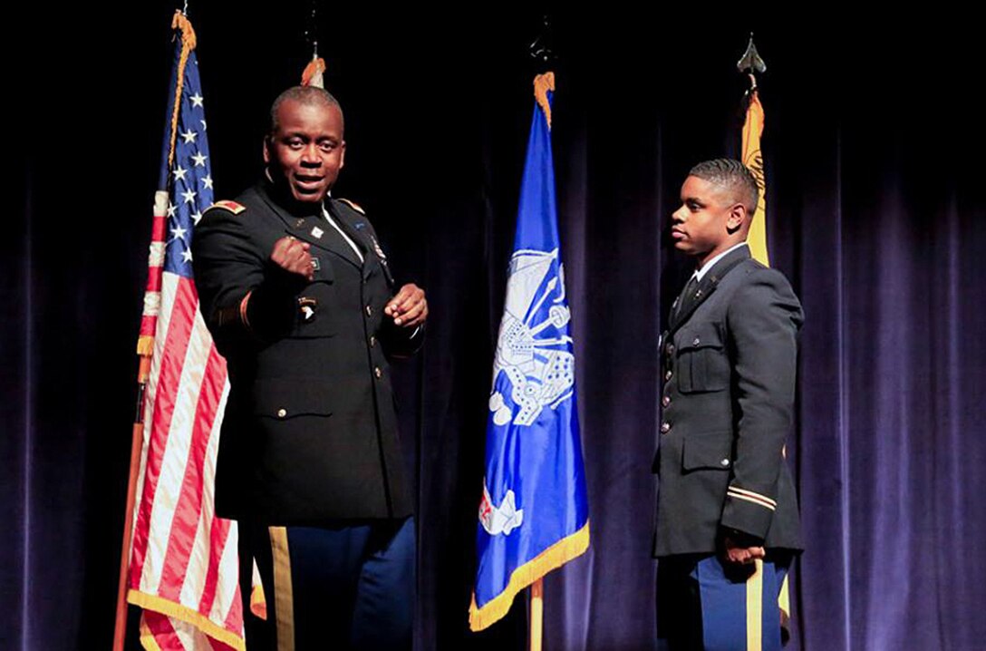 Army Col. Derrin E. Williams, commander of Defense Logistics Agency Central, addresses a class of new Army officers, including Army 2nd Lt. Marcus Rivers, at a Dec. 11 ceremony at Florida A&M University in Tallahassee.