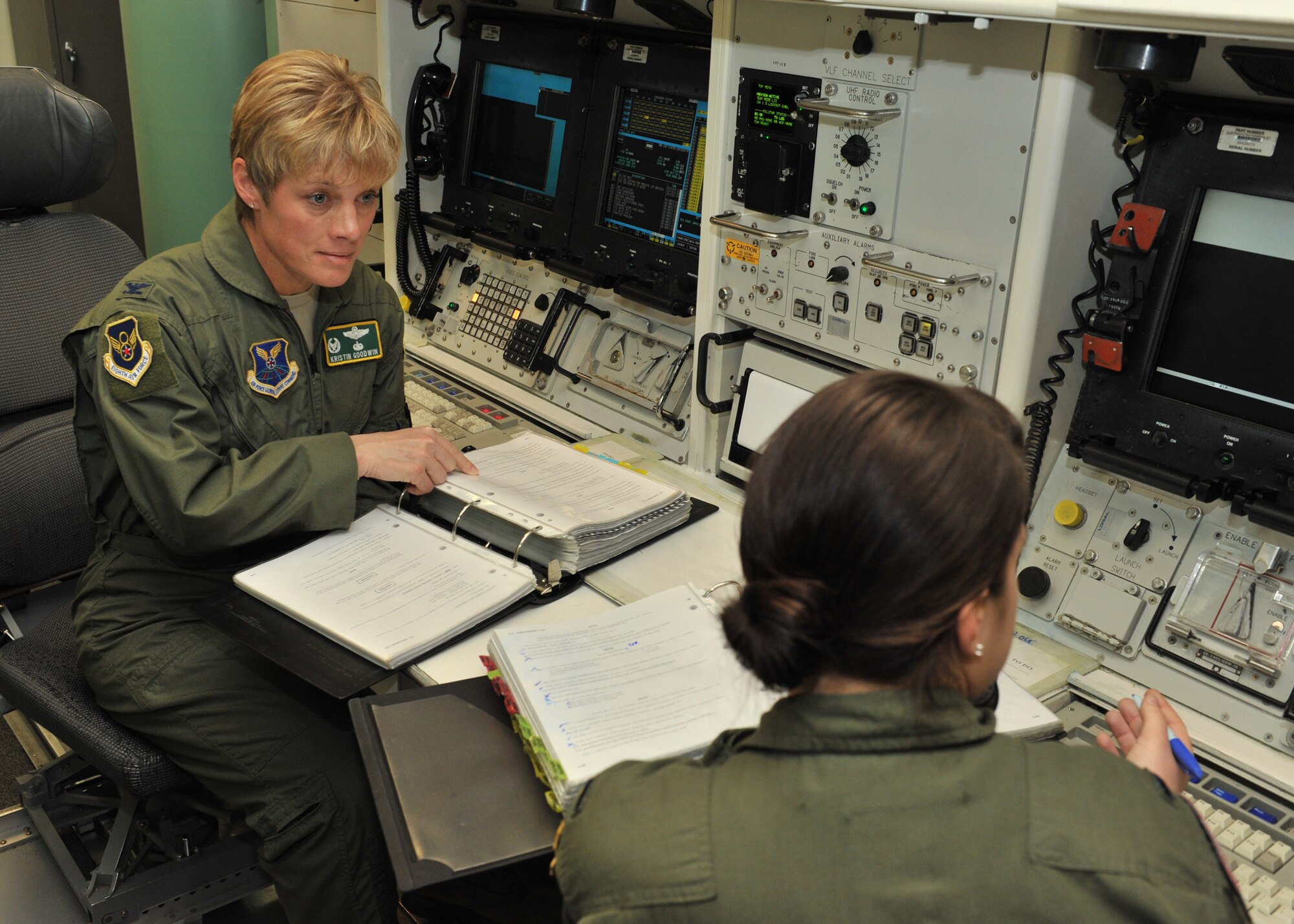 Col Kristin Goodwin, 2nd Bomb Wing commander, talks with an attendee of the Bomber Missile Exchange Course at Malmstom Air Force Base, MT., Dec. 16, 2015. The formal course is designed to occur within two one week-long phases and involves bomb wing personnel travelling to the missile wing during part one then reciprocating as hosts during week two. By targeting Airmen within the E-7, E-8 and O-2 and O-3 ranks, the goal is to ultimately build a core of mid-level Air Force Global Strike Command leaders with a broad understanding of the nuclear enterprise. (Courtesy Photo)