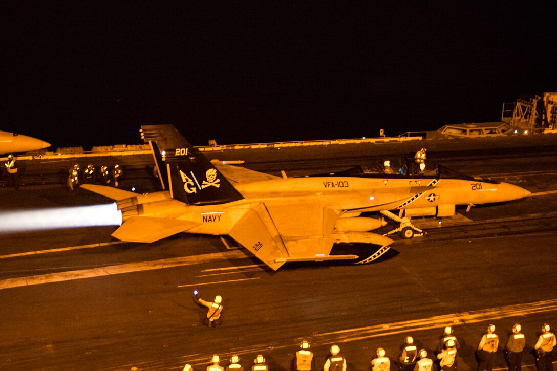 An F/A-18F Super Hornet launches from the flight deck of the aircraft carrier USS Harry S. Truman in the Arabian Gulf, Dec. 28, 2015.
The Harry S. Truman Carrier Strike Group is deployed in support of maritime security operations and theater security cooperation efforts in the U.S. 5th Fleet area of responsibility. U.S. Navy photo by Mass Communication Specialist 3rd Class B. Siens
