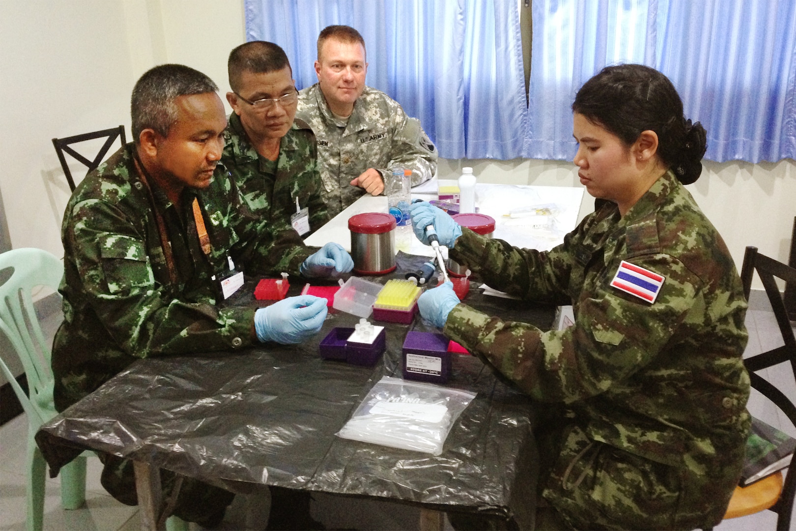Capt. Kantima Niweswan, with the Royal Thai Army Chemical Department, demonstrates the Smart-DART Platform during Operation Crimson Viper 2014, to test for water purity at Chao Samran, Thailand, Sept. 23, 2014. 