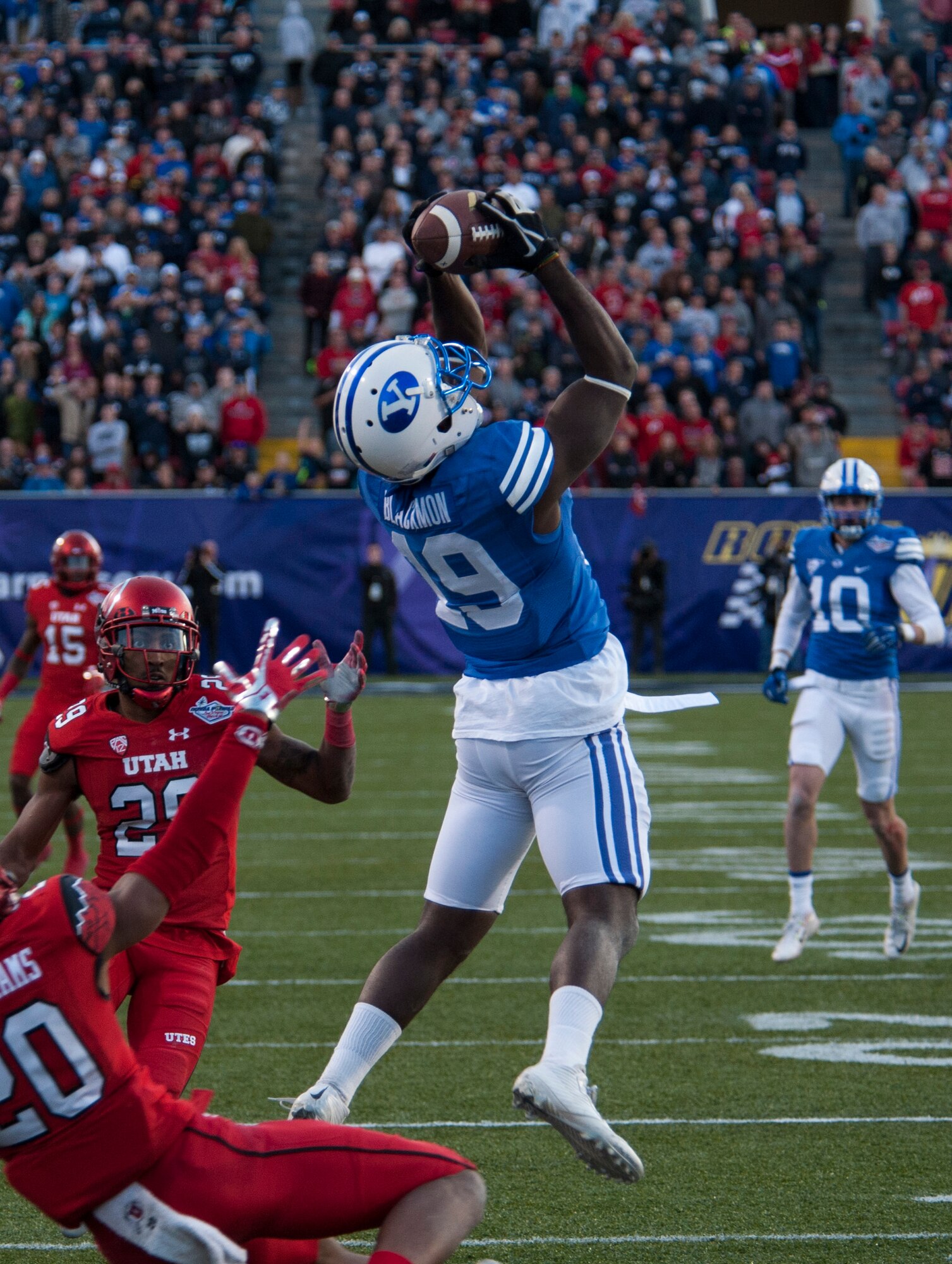 Brigham Young University wide receiver Davon Blackman catches a long pass during the Royal Purple Las Vegas Bowl at Sam Boyd Stadium in Las Vegas, Dec. 19, 2015. Despite a late-game rally, the BYU Cougars lost to the Utah Utes 35-28. (U.S. Air Force photo by Senior Airman Thomas Spangler)