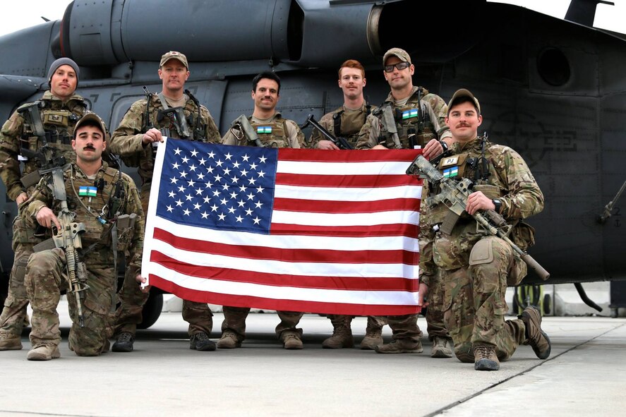 The day after Christmas, deployed pararescuemen from the 304th Rescue Squadron freefall jumped with an American a flag for each of the six Airmen who were tragically killed in a suicide bomb attack near Bagram Air Field, Afghanistan, Dec. 21. Killed were: Maj. Adrianna Vorderbruggen, 36, of Plymouth, Minn.; Tech. Sgt. Joseph G. Lemm, 45, of Bronx, N.Y.; Staff Sgt. Michael A. Cinco, 28, of Mercedes, Texas; Staff Sgt. Peter W. Taub, 30, of Philadelphia; Staff Sgt. Chester J. McBride, 30, of Statesboro, Ga.; and Staff Sgt. Louis M. Bonacasa, 31, of Coram, N.Y. They were all part of the Air Force Office of Special Investigations, a military law enforcement agency. The Airmen were on a security patrol when a suicide bomber plowed his motorcycle into their foot patrol and detonated his explosives. In addition to the dead, two U.S. Airmen and an American interpreter were injured, according to Stars and Stripes. The 304th RQS pararescuemen who jumped in their honor are based out of Portland, Ore., and are a geographically-separated unit which is part of the 943rd Rescue Group at Davis-Monthan Air Force Base, Ariz. The jump team was fortunate enough to meet Vorderbruggen and her team members a couple of weeks prior to the incident. (Courtesy photo)