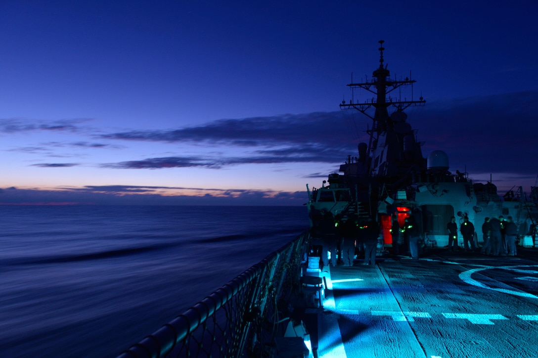 U.S. sailors conduct low-light training aboard the Arleigh Burke-class guided-missile destroyer the USS Ross in the Mediterranean Sea, Dec. 19, 2015. The Ross is forward deployed to Rota, Spain, on routine patrol in the U.S. 6th Fleet area of operations. U.S. Navy photo by Petty Officer 2nd Class Justin Stumberg