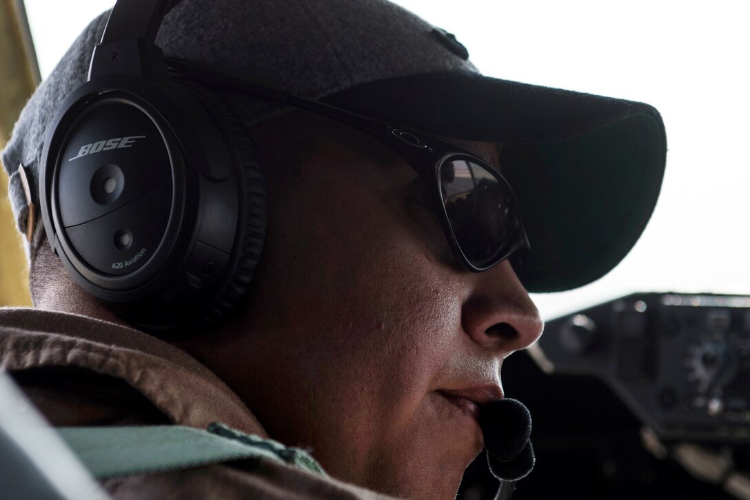U.S. Air Force Maj. Steve Briones prepares to fly a KC-135 Stratotanker in support of Operation Inherent Resolve from Al Udeid Air Base, Qatar, Dec. 22, 2015. Briones is a pilot assigned to the 340th Expeditionary Air Refueling Squadron, deployed out of the 351st Air Refueling Squadron in RAF Mildenhall, England. U.S. Air Force photo by Staff Sgt. Corey Hook
