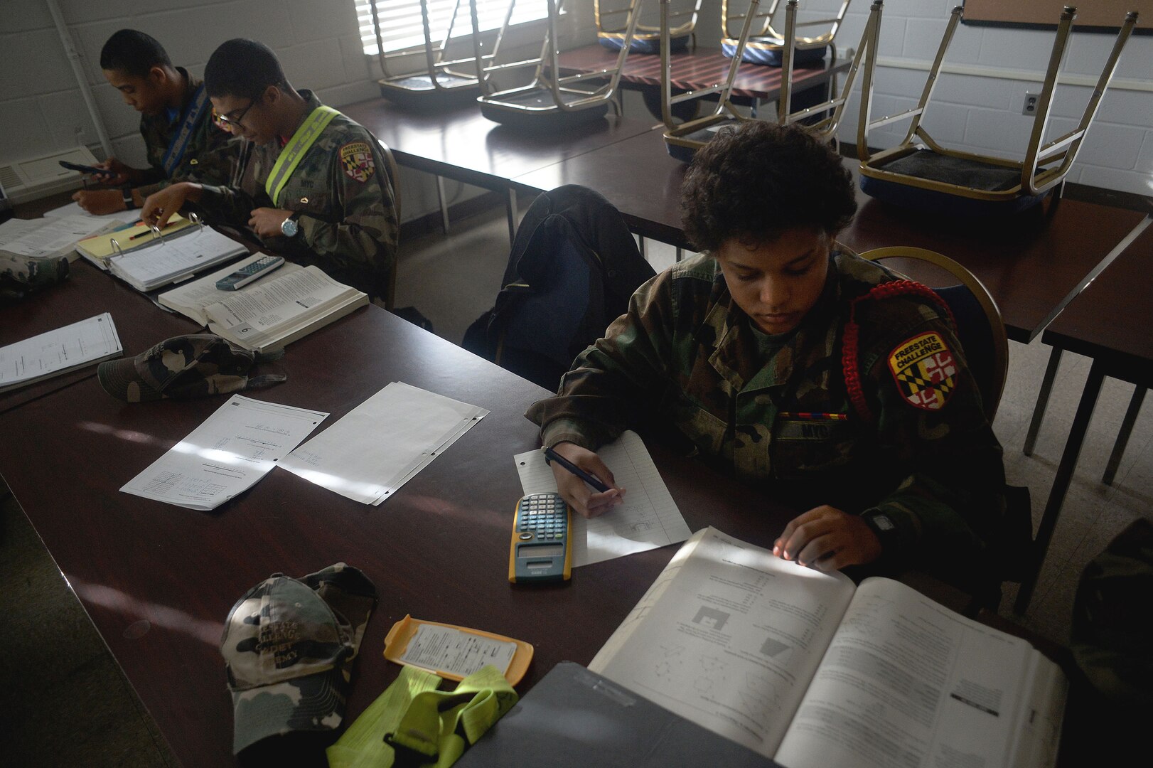 Devin Dunn, a cadet with the Maryland National Guard’s Freestate ChalleNGe Academy, which provides a means for "at risk" 16-to-18-year-olds to earn their GED certificate or high school diploma, works through math problems during class at the academy, Nov. 17, 2015. Part of the National Guard’s Youth ChalleNGe Program, which includes 37 academies throughout the country, the Freestate ChalleNGe Academy opened in 1993 and was one of the first academies of the program.